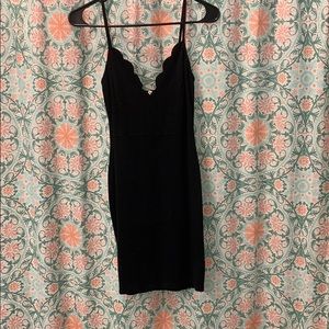 Black scallop mini dress